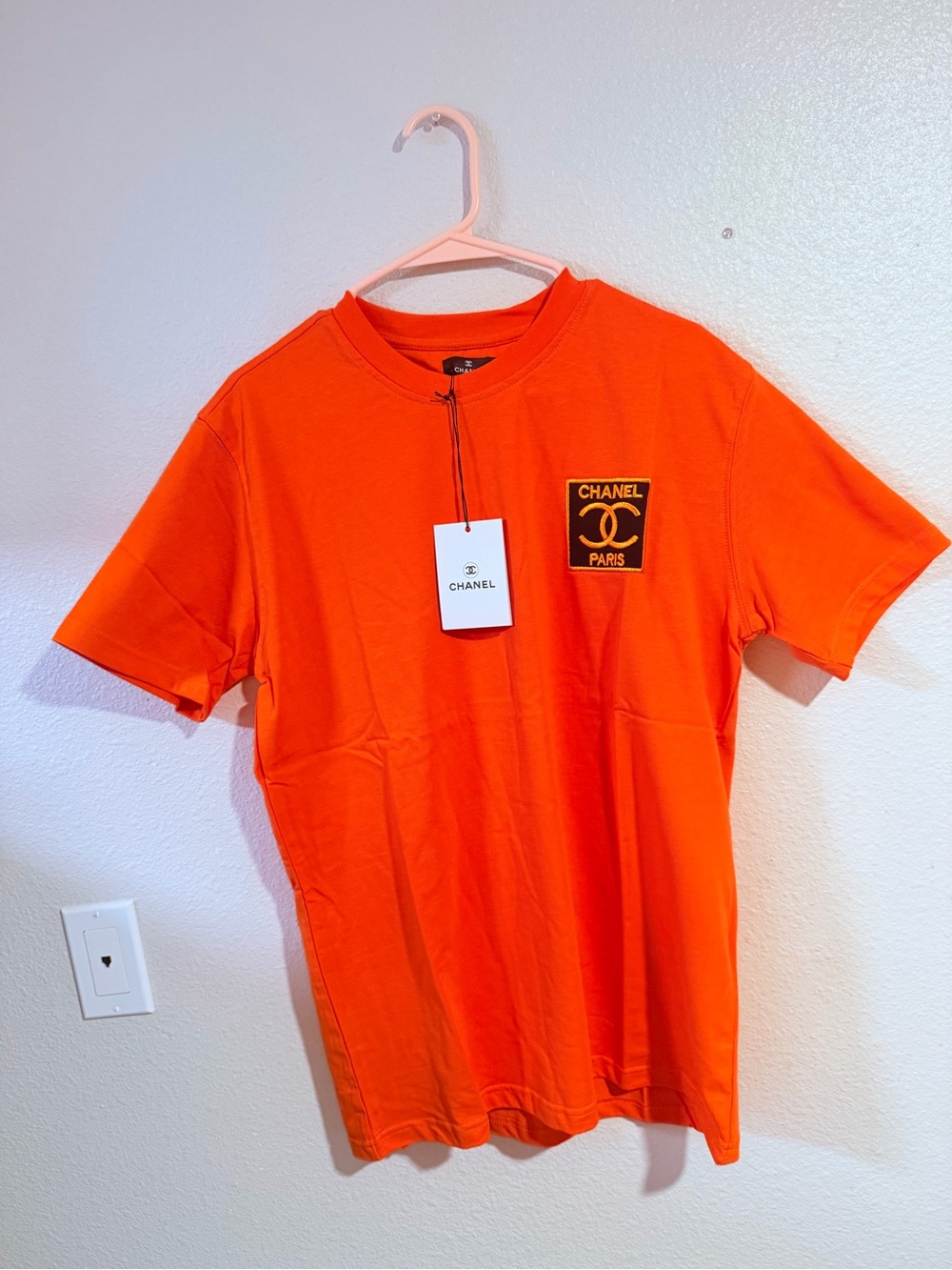 CHANEL Orange Crewneck Tee with Logo Patch